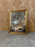 Miroir rectangulaire doré bisauté à pans coupés style Louis-Philippe
